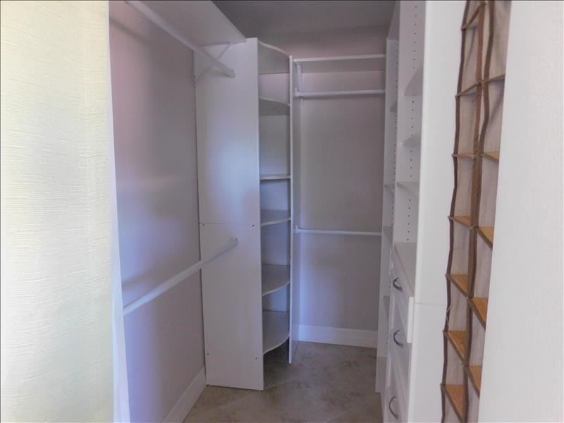Master walk in closet with built in shelves