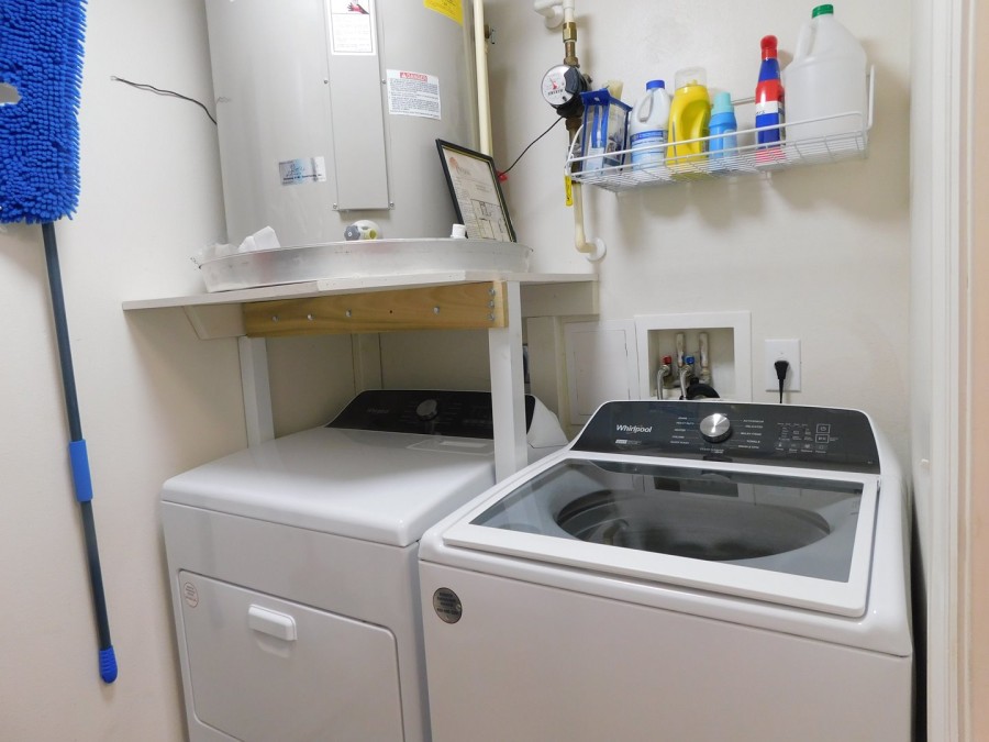 Laundry room with full size washer and dryer